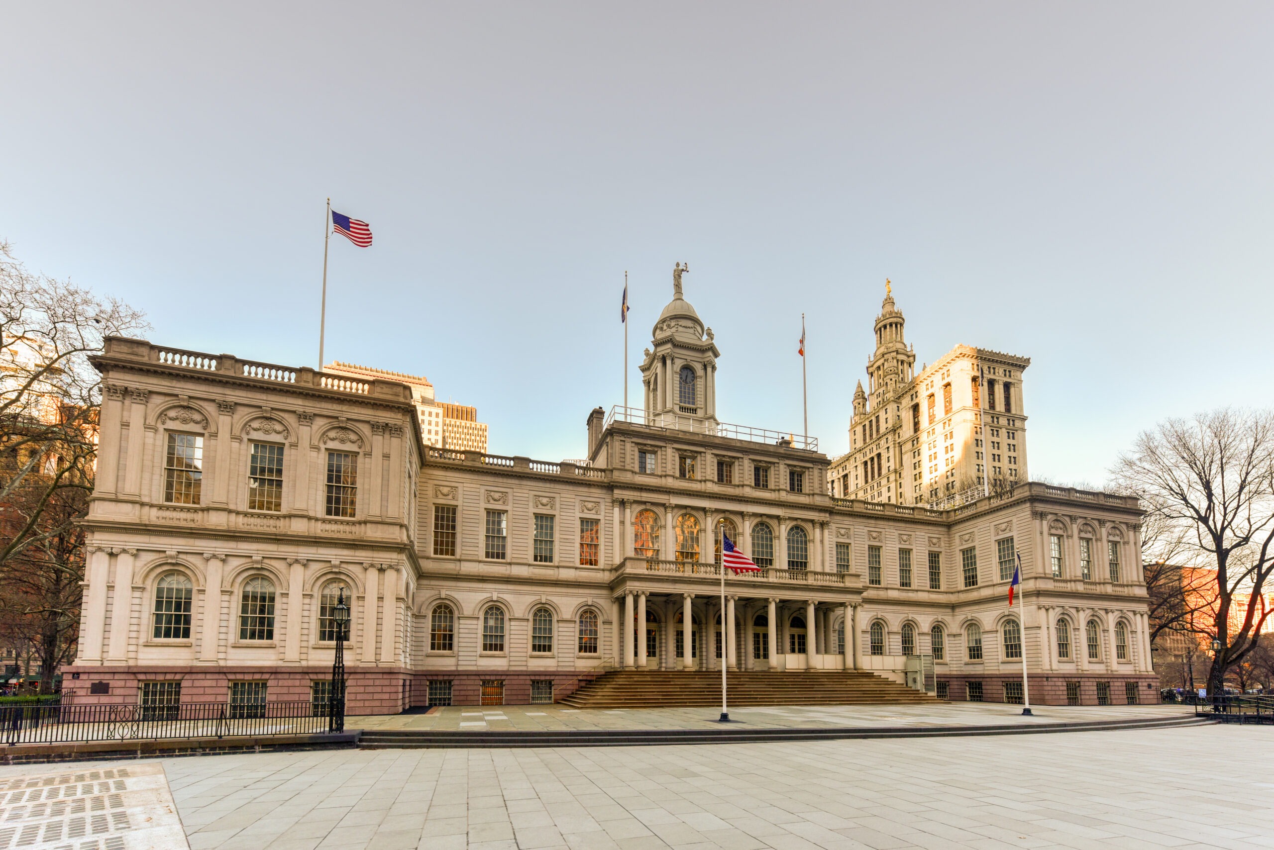New York City Hall, the seat of New York City government, located at the center of City Hall Park in the Civic Center area of Lower Manhattan, between Broadway, Park Row, and Chambers Street.