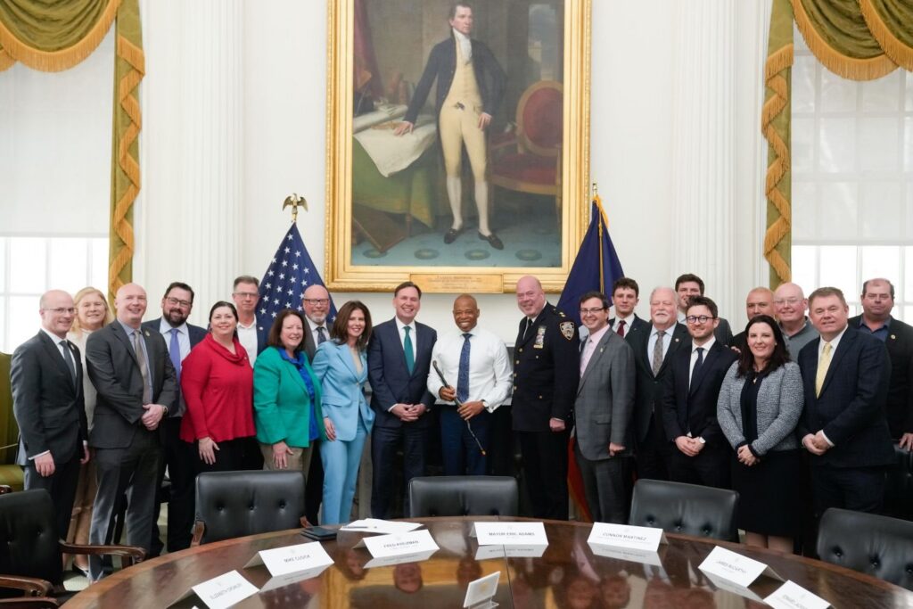 Darren T. Moore with then Mayor Eric Adams and Irish-American community leaders at New York City Hall
