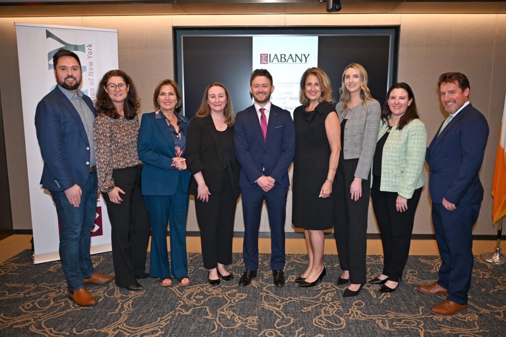 IABANY members and guests at the 2025 Wine Geese Awards with Darren T. Moore at center